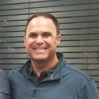Chase Peckham - Director de Alcance Comunitario, San Diego Financial Literacy Center