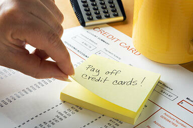 post-it note to pay off credit cards