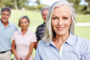 women and money, retirement; smiling retired woman