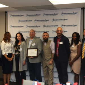 Consolidated Credit accepts a certificate of recognition from the United Way of Broward County Mission United team at our 8th annual financial literacy breakfast